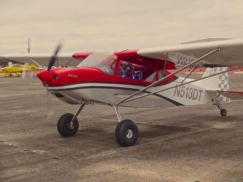 RANS President and chief designer Randy Schlitter gets ready to demonstrate his new S-20 light sport side-by-side taildragger against overcast skies at the Sebring Expo.