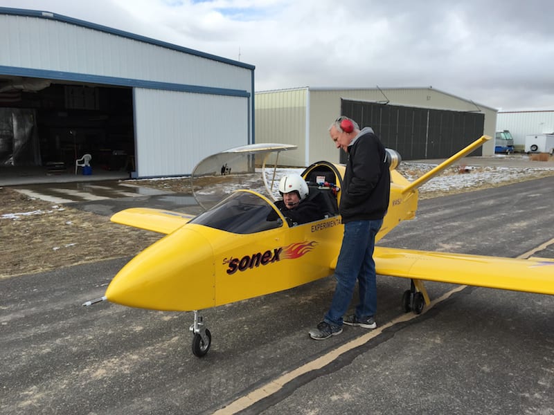 In-preparation for his first flight of the aircraft, John Monnett goes through the SubSonex JSX-2 checklist with test pilot and airshow performer Bob Carlton.