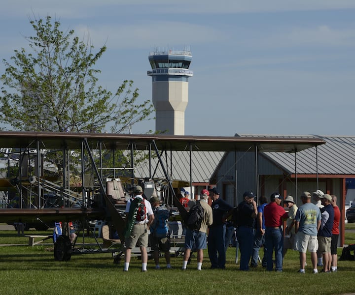 Wittman Field’s control tower is visible in background as the Wright “B” Flyer is on display at AirVenture.