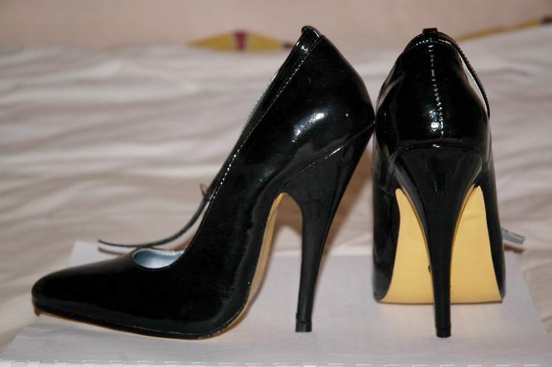 While fashion forward, high heels are not the best footware for flying a plane.