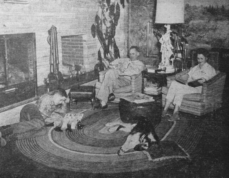 The Dyers relax after a hard day. Steve, 16 year old son of the Dyers, curls up with a book by the fireplace while J.E. and Veda relax in their favorite chairs. Even the family pets join the circle. Cindy, a Siamese, finds the rug comfortable, and Fauna is probably one of the few dogs who will not sleep without her head on a pillow.