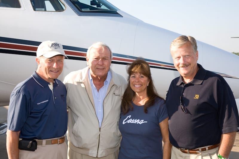Arriving at Oshkosh 2008, Arnold Palmer (second from left) is greeted by Tom Poberezny, Rose Pelton and Jack Pelton.