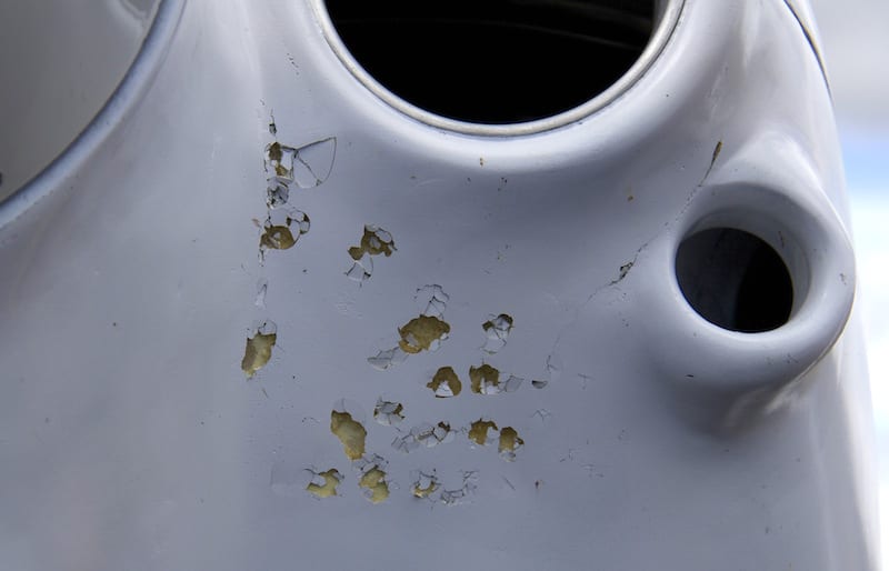 Few of the air racers arrived without weather tales to tell. Two of the race planes encountered hail inbound. The most heavily damaged was Steve Hammer’s Race 73, a Glasair 1 TD, which will take a little more than buffing to repair. (Photo by Lisa F. Bentson)