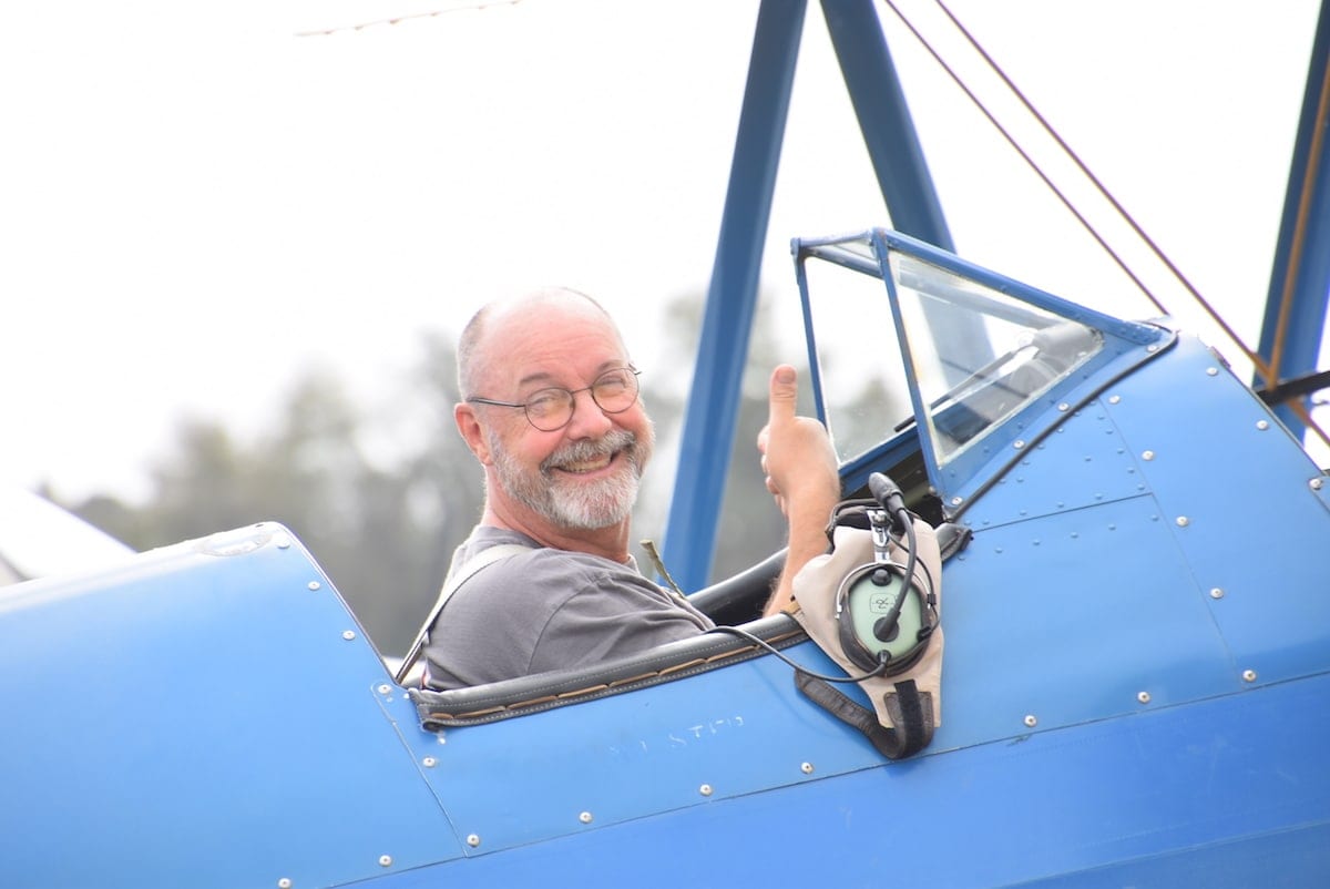 A happy Jamie Beckett after completing his Flight Review in a Boeing PT-17 Stearman.