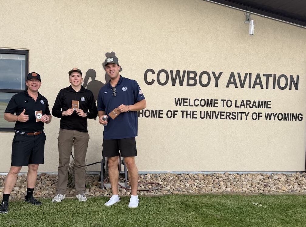 Pilots from Sheridan Pilots 307 celebrating the completion of the WYFly Passport Program at Sheridan County Airport.